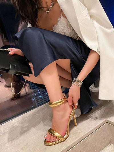 Fashionable Gold Strappy Stiletto Sandals